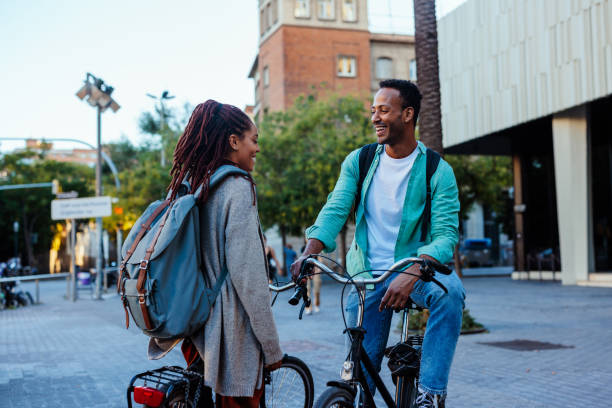 istock Cheerful couple with bicycles outside. 1436423905