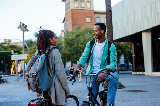 istock Couple with bicycles in the city. 1436423916