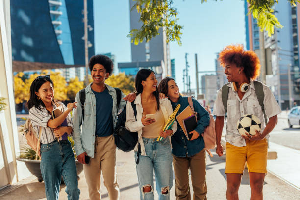 istock Cheerful urban students in city. 1436426794