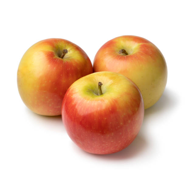 istock Three whole fresh ripe Kanzi apples on white background 1436426973