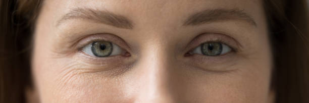 istock Cropped horizontal shot female eyes staring at camera 1436427102