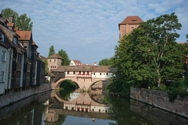 istock Henkerbrucke Romantic medieval bridge in Nuremberg . Old Town and Pegnitz river in Nuremberg Bavaria Germany 1436428603