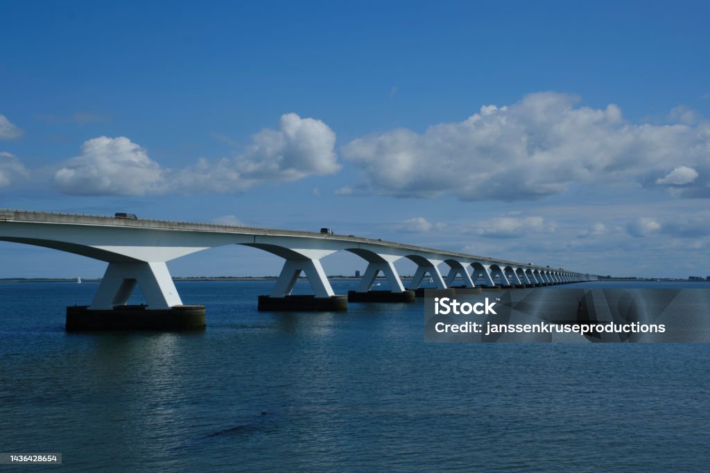 View on longest bridge in the Netherlands, Zealand bridge spans Eastern Scheldt estuary, connects islands Schouwen-Duiveland and Noord-Beveland in province of Zeeland, water of Oesterschelde and boats Accidents and Disasters Stock Photo