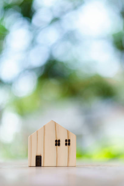 istock Wooden house with background nature and bokeh 1436429259