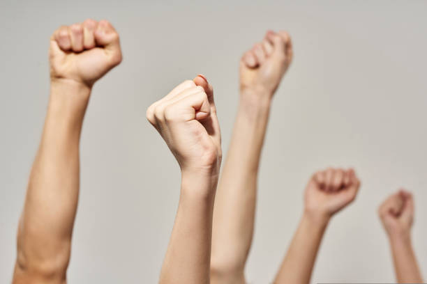 istock Partial hands with fists during political rally 1436429453