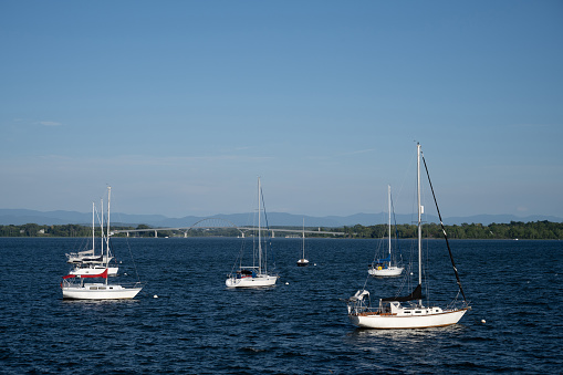 Sailboats at anchor near the Champlain Bridge in Lake Champlain