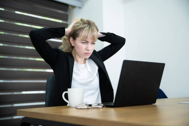 istock An office worker lady tired at the desk 1436433226