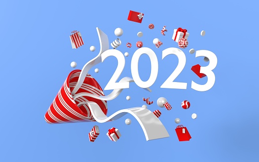 2023 text coming out of a megaphone with gift boxes paper confetti and party streamers splashing over blue background. Easy to crop for all your social media and print sizes with copy space. For party, new year and holiday concepts.
