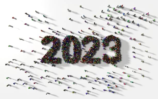 istock Large Crowd of People Forming 2023 Text Against White Background 1436437365
