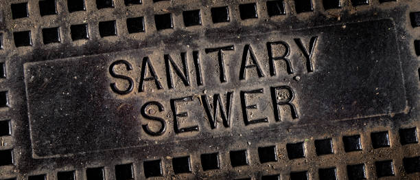 Sanitary Sewer Man Hole Cover Iron Lid stock photo