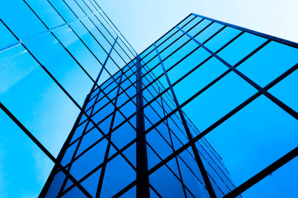 istock Business Building with Glass Windows Reflecting Blue Sky 1436438147