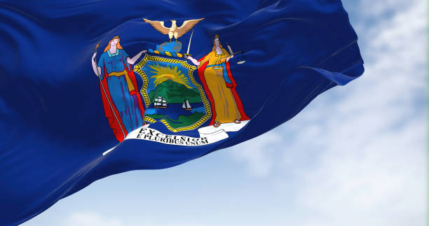 the flag of the american state of new york waving on a clear day. - federated imagens e fotografias de stock