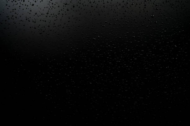 istock Water droplets on the floor with black background 1436444599