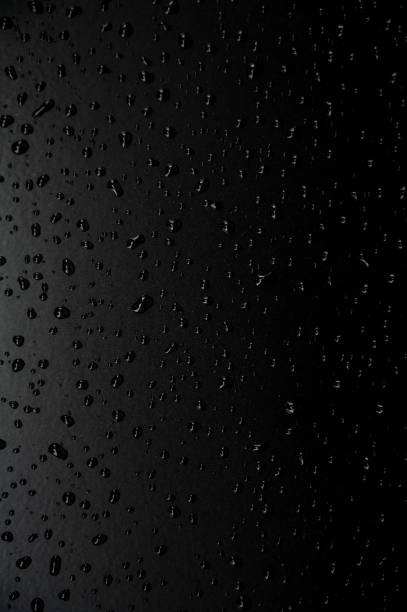 istock Water droplets on the floor with black background 1436444608