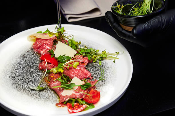 istock Carpaccio with arugula and parmesan in the restaurant 1436445631