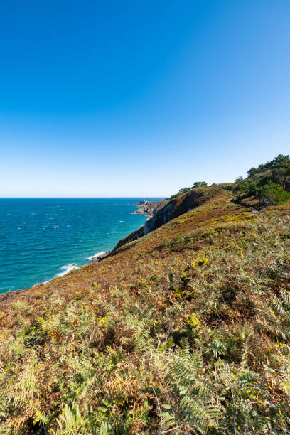 istock walk on the GR34 in Brittany with far away La Latte fort 1436445741