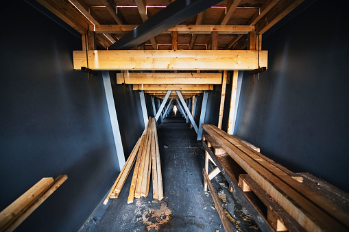 A wide view within a steel bridge girder.