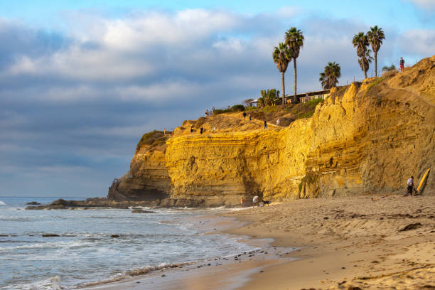 Waves crashing along the rocky coastline of northern San Diego County in Carlsbad, California.