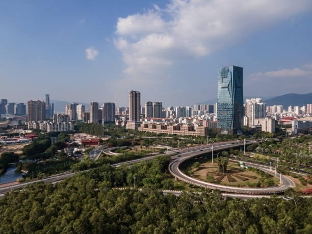 istock Urban traffic overpass and prosperous downtown buildings 1436449906