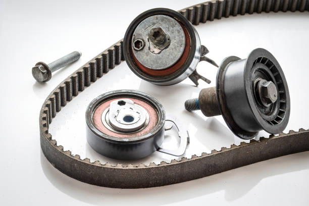 istock timing belt and rollers set. used part detail of internal combustion engine 1436451774
