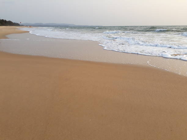 istock Wave of the sea at the sunset light. Goa beach. 1436453094