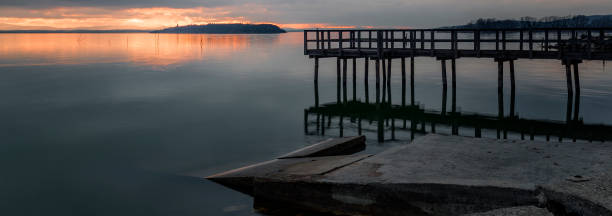 istock sunset over Lake Trasimeno 1436453101