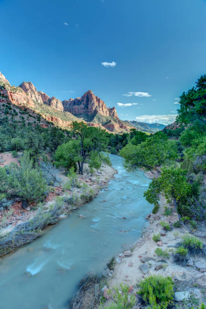 Zion Canyon at Sunset Sunset falls over Zion Canyon and the Virgin River in Utah. virgin river stock pictures, royalty-free photos & images