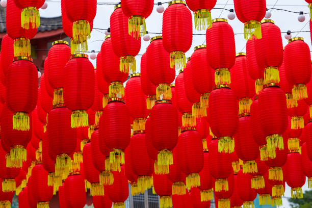 istock Close-up of festive red lanterns hanging on the ceiling 1436458522