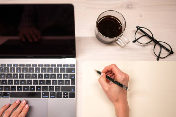 istock Close-up of businesswoman's hands during work on computer 1436463129