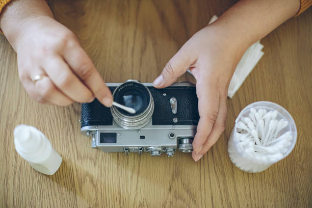 istock Cleaning the old faithful analogue camera 1436463186