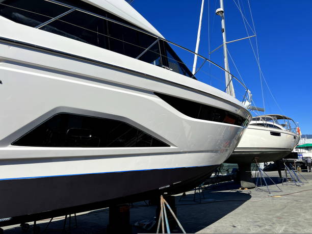 istock granville island Two beautiful ships stand on a raised platform prepared for repairs good weather bright clear sky Rich life of luxury 1436463231