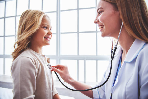 istock Little girl and pediatrician 1436469932