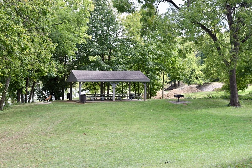 The empty picnic shelter in the park.