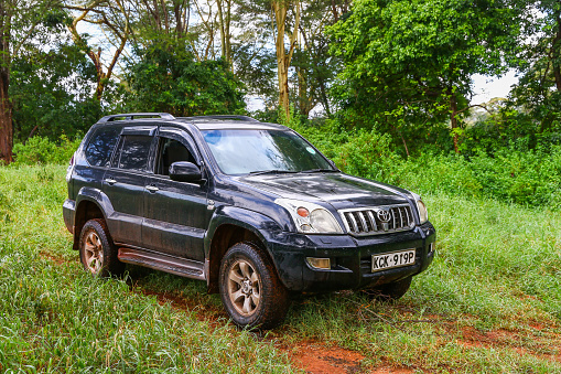 Taita Hills, Kenya - February 3, 2021: Old 4x4 vehicle Toyota Land Cruiser Prado 120 in the Tsavo West National Park.