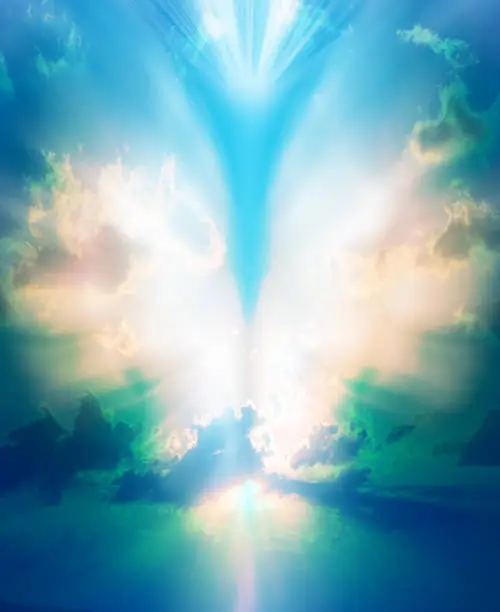 Photo of Angelic shape with white wings  on the sky