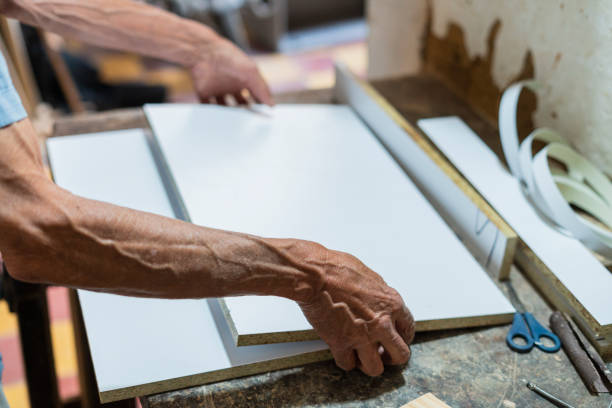 istock older adult man carpenter by profession is in his carpentry working 1436486996