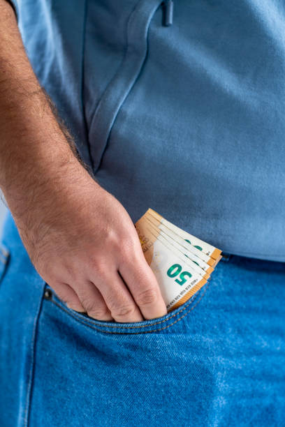 istock pile of euro banknotes in pocket 1436490153
