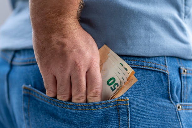 istock pile of euro banknotes in pocket 1436490159