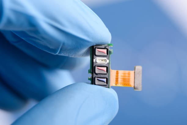 istock Scientist hold in fingers fitness tracker smart watch component with different sensors array 1436493161
