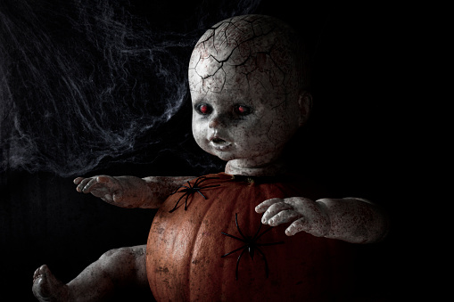 Zombie doll.  Halloween concept.