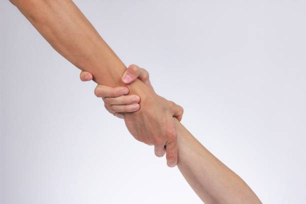 istock strong male handshake with bare hands on a white background 1436496967