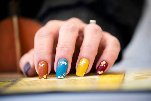 istock Autumn Colored Gold Nail Art Design 1436497894