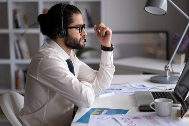 istock businessman working from home online sitting at home office with laptop during quarantine 1436502865