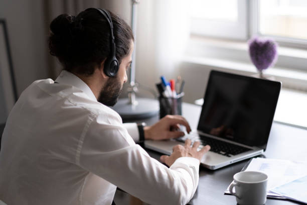 istock Businessman working at home with pajamas 1436505210