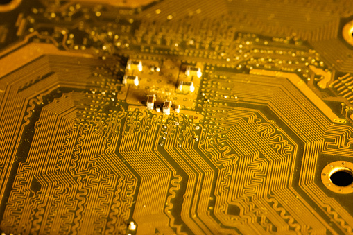 Golden computer mother board close up