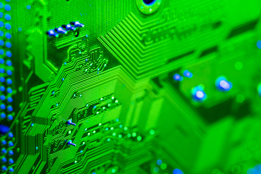 Macro shot of computer mother board with green light