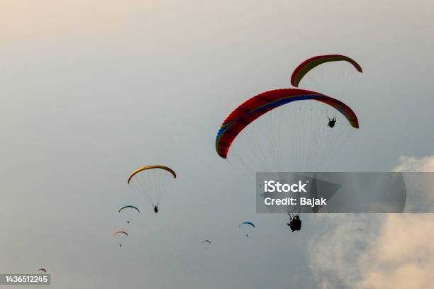 Paragliders At Sunset Stock Photo - Download Image Now - Abstract, Adult, Adults Only