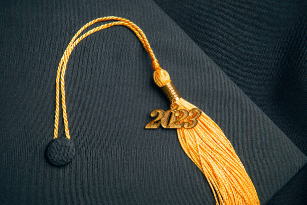 Close Up of 2023 Charm on Graduation Tassel stock photo