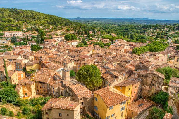 Travel destination, small old village in hear of Provence Cotignac with famous cliffs with cave dwellings and troglodytes houses, Var, Provence Alpes Cote D'Azur, France stock photo