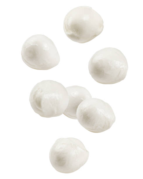istock Falling Mozzarella cheese isolated on white background, clipping path, full depth of field 1436515959